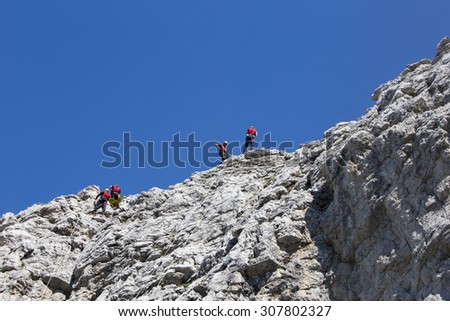 CORTINA D\'AMPEZZO, ITALY, June 08: Mountain rescue team members in action in the mountains of Dolomites also known as the Soccorso Alpino - June 8th 2014 in Italy.