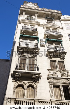 Typical old classical architecture in the center of Buenos Aires against a blue sky. Argentina 2014