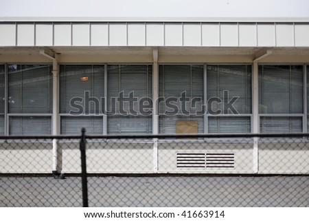 Building elevation - generic building with large windows and closed metal blinds