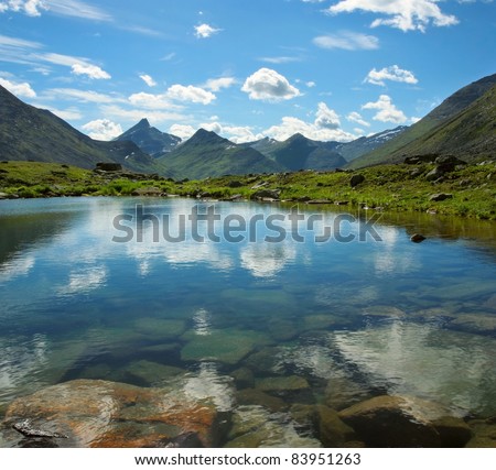 Small mountain lake in Ural mountains, Yugyd Va National Park, Near-Polar Ural, Russia.