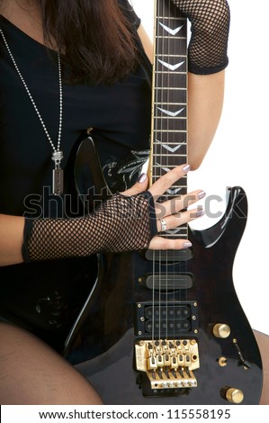 Beautiful woman with electro guitar