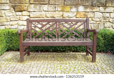 garden bench in castle garden / garden bench