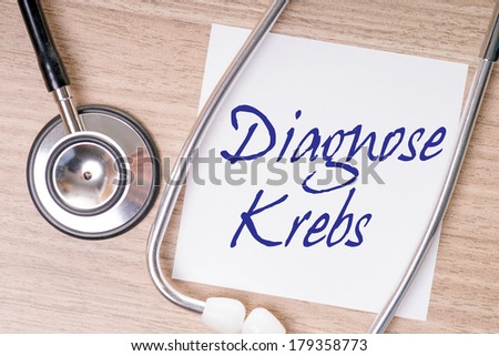 Stethoscope with notepad and the german words cancer diagnosis / cancer diagnosis