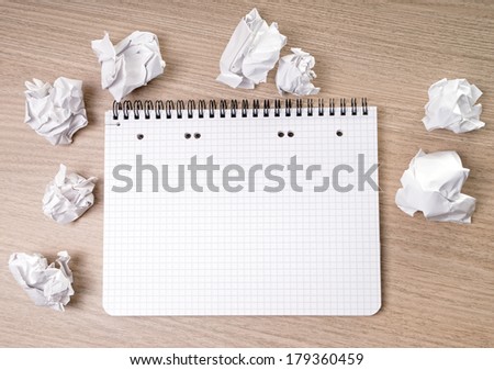 blank notepad on a table / blank writing pad