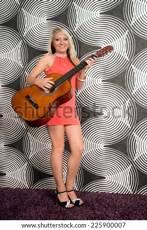 young woman with a guitar / Woman and a Guitar