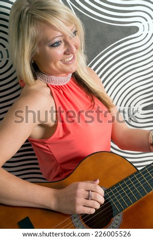 young woman with a guitar / Woman and a guitar