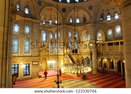 ISTANBUL,TURKEY-DEC 26: Muslims pray inside of Eyup Sultan Mosque on Dec 26,2012 in Istanbul,Turkey. Eyup Sultan is the first mosque constructed by the Ottoman Turks in the city.