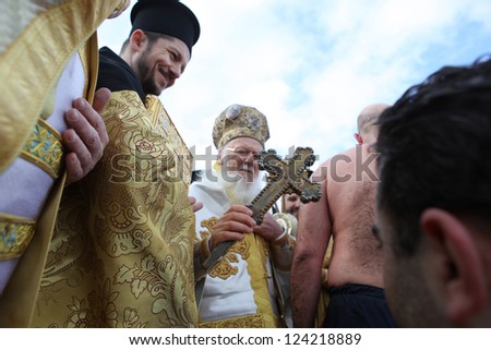 ISTANBUL,TURKEY-JANUARY 6: Orthodox Christians in Istanbul reenacted the baptism of Christ with a traditional cross-throwing ceremony on January 6, 2012 in istanbul,Turkey.