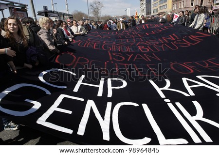 ISTANBUL,TURKEY-MARCH 31:Unidentified people protest the decision of the statute of limitations in the case of the Sivas Massacre on March 31, 2012, in Istanbul,Turkey.