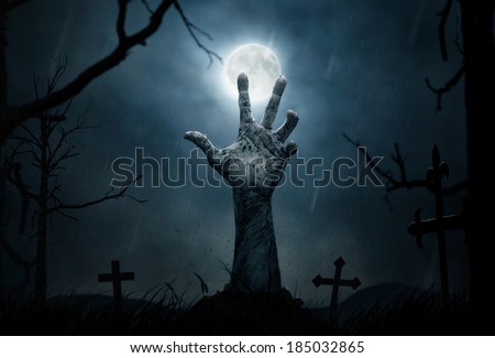 Halloween Concept, Zombie Hand Rising Out From The Ground Stock Photo ...