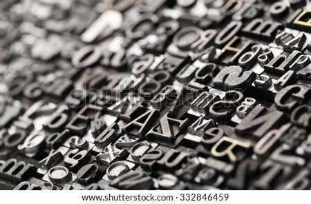 Letterpress background, close up of many old, random metal letters with copy space 商業照片 © 