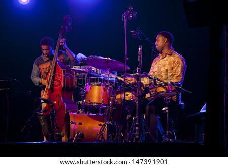 GRANADA, SPAIN - JULY 18:  Joshua Crumbly (bass) and Kendrick Scott (drum) at the XXVI Jazz Festival on July 18, 2013 in Almunecar, Spain