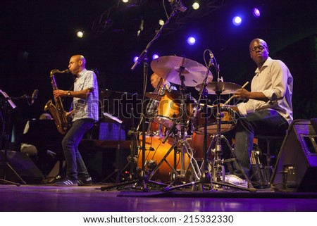 ALMUNECAR, GRANADA / SPAIN - JULY 21, 2014: Joshua Redman Quartet playing live music, at XXVII international jazz festival of Almunecar, Jazz in the Cost. Joshua Redman, sax, and G. Hutchinson, drums.