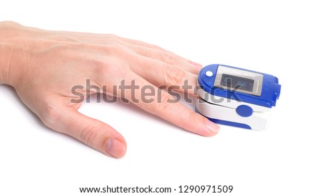 Similar – Finger with pulse oximeter