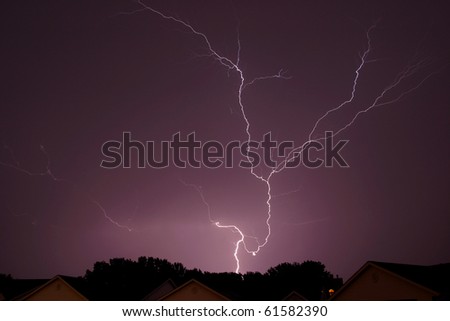 windy thunder storm with rain clouds and lightning