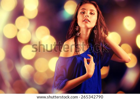 Portrait of dancing girl on the club party.
