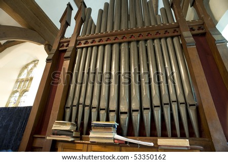A small church organ in a rural English church