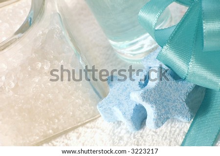 bath items. towel, salt, soap. blue spa