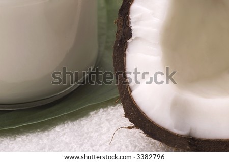 coco bath items. coconut, milk, towel. white spa