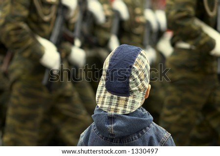 boy and military parade