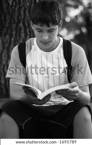 teen with book(special photo f/x,focus point on the face)