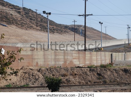 US Mexico border fence on Tijuana side looking into San Diego
