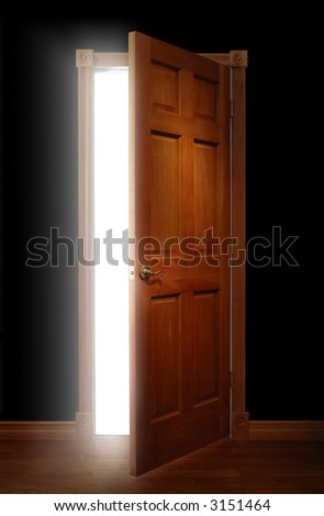 Door opening with bright light illuminating a dark space