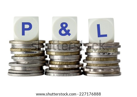 Stacks of coins with the letters P&L isolated on white background  Stock fotó © 