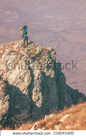 Woman hiking in beautiful mountain, recreation and healthy lifestyle outdoors in nature. Hiker backpacker looking at view.
