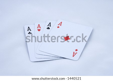 A deck or hand of playing cards containing the aces from all four suites