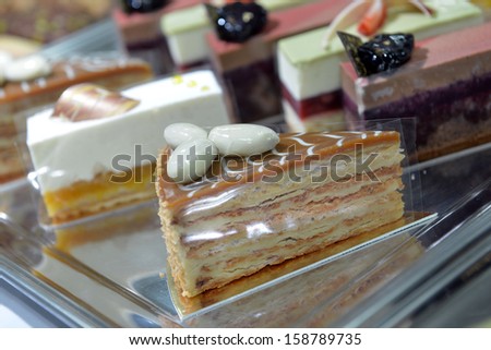 set of cakes with berries on the table