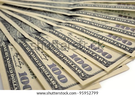 heap of dollars, money background on a white