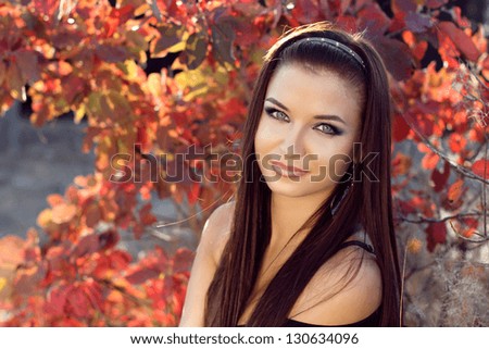 Pretty girl relaxing outdoor, beautiful teenager on nature background