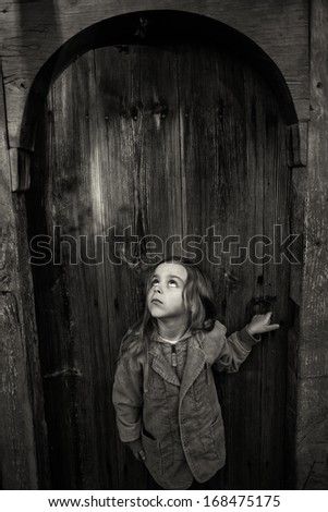 boy and doors black and white photography