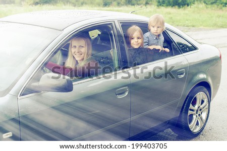 Happy family in car