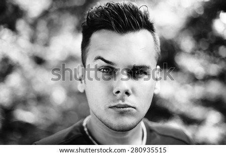 portrait of a young man black and white photography