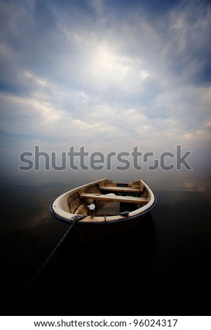 white boat and storm