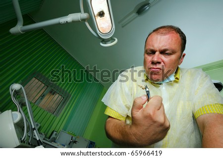 Crazy dentist during work