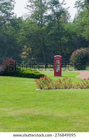 landscape with lawn with phone booth