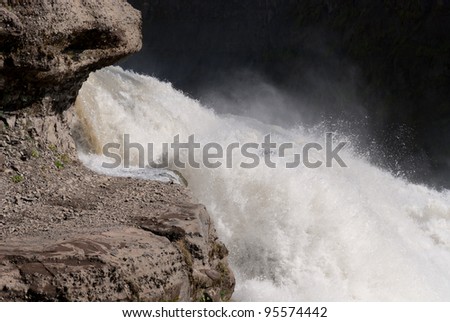 detail of a jet of water in the Gullfoss waterfall in Iceland