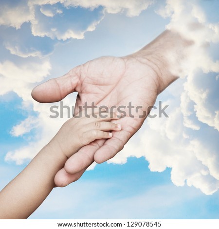 Baby hand reach out to god