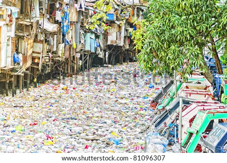 MANILA, PHILIPPINES - JANUARY 6: A river of garbage prevents the flow of water on January 6,2008 in Manila, Philippines.  Poverty and garbage disposal are major issues in the Philippines.