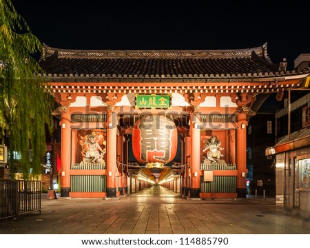 TOKYO, JAPAN - OCT 7: Imposing Buddhist structure features a massive paper lantern painted in vivid red-and-black tones to suggest thunderclouds and lightning on October 7, 2012 in Tokyo, Japan