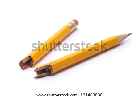 Broken pencil pencil on white background, close-up