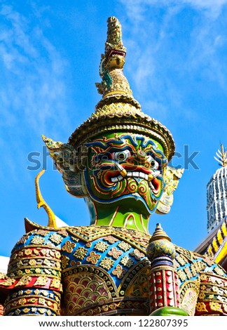BANGKOK THAILAND - DEC 22 : Demon statue on Grand Palace or Temple of the Emerald Buddha (also called Wat Phra Kaew) on December 22, 2012 at Bangkok, Thailand.