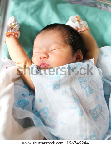 Newborn asian baby girl in hospital