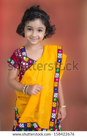 Portrait Of A Smiling Little Girl In Traditional Indian Costume Stock ...