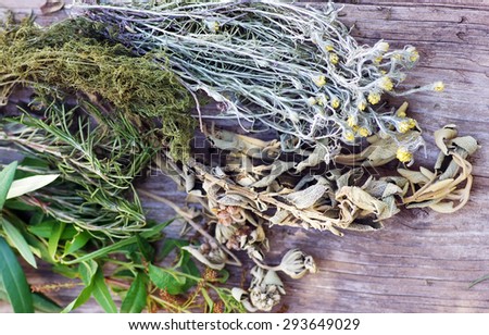 Dry Herbs  on a wooden background