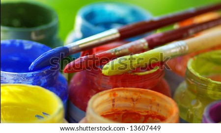 Color bottles and brushes for artistic paintings.