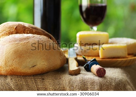Bread, cheese and red wine.